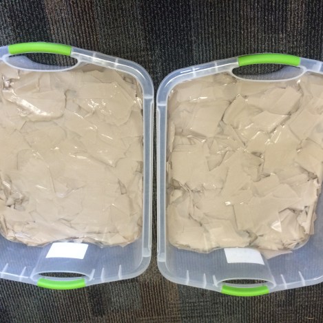 We presoaked brown wrapping paper to be used as the base of the paper.